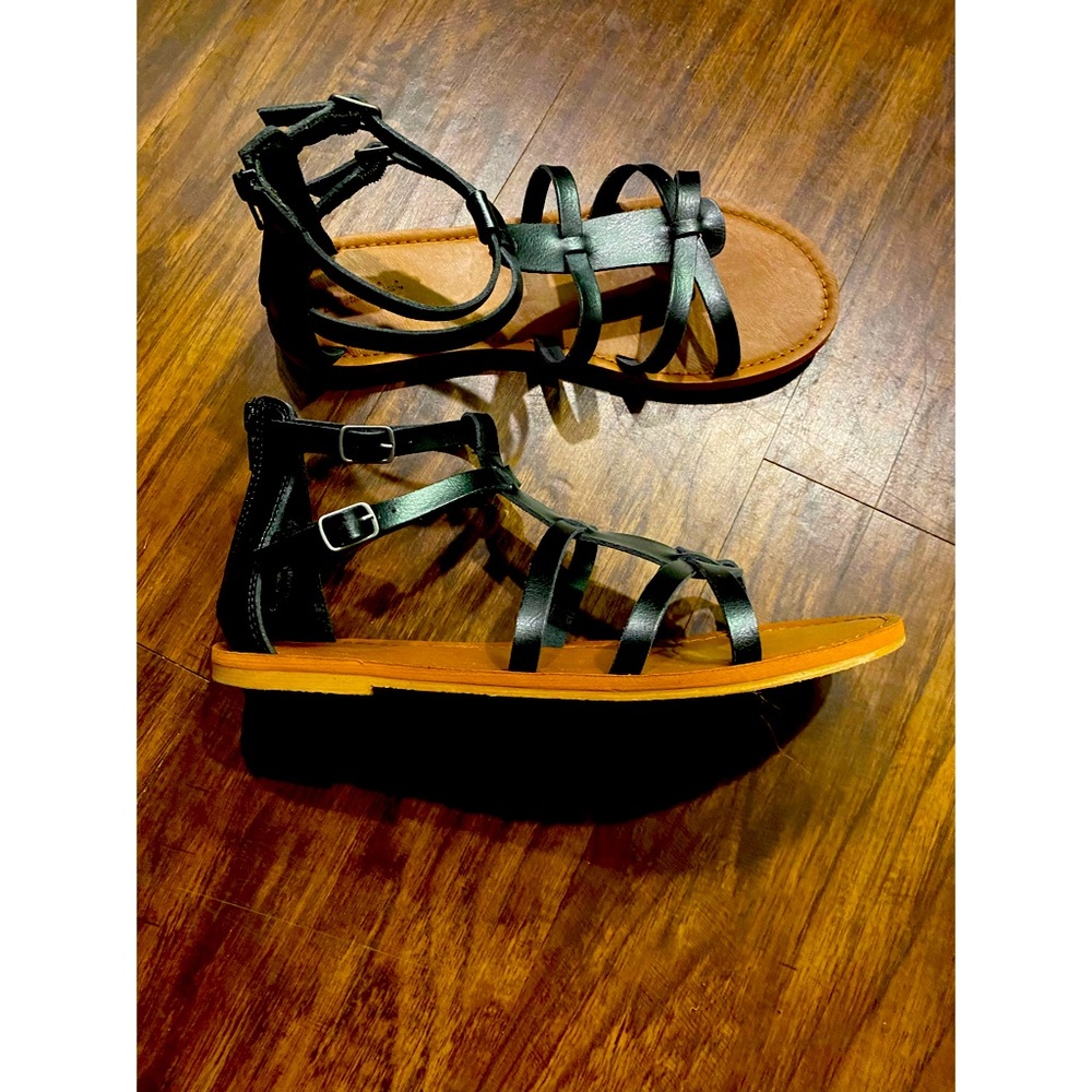 Black leather gladiator style sandals